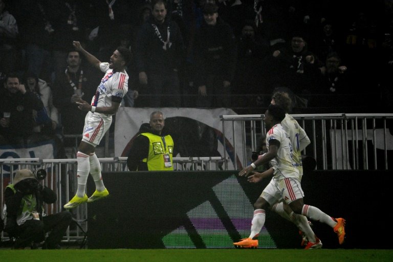Lyon players celebrating Ligue 1 victory