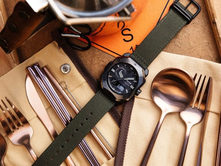 A group of business professionals analysing financial data and discussing investment opportunities in the UK, with a focus on UK business finance and corporate funding