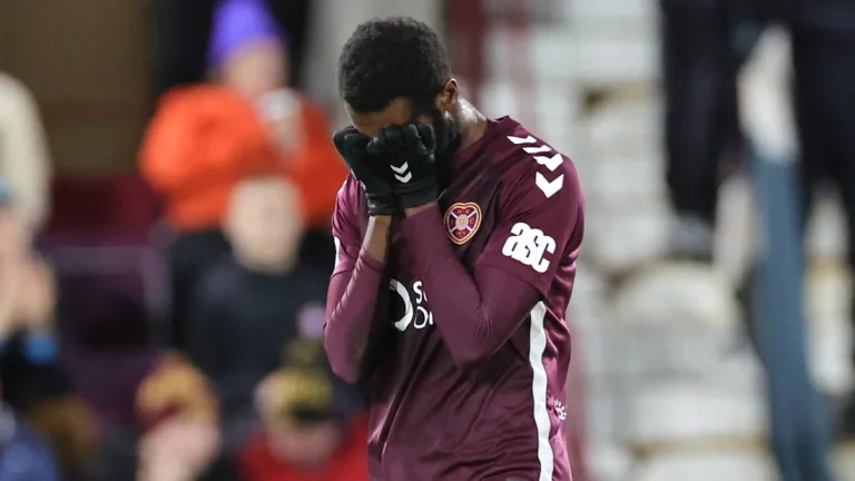 Hearts football player in action