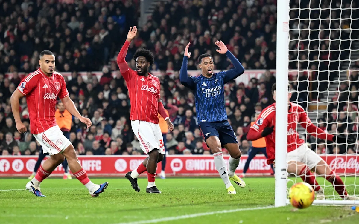 Arsenal players in action during a premier league match